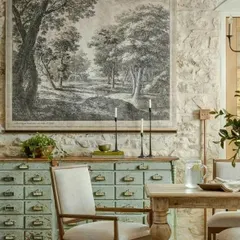 For a classic and timeless look, we offer commissioned charcoal landscapes. These detailed, monochromatic drawings are perfect for adding a touch of vintage elegance to a dining room or study.