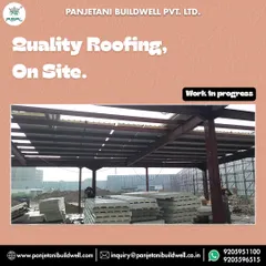 Another view of the Experion project, with stacks of our PUF panels on-site ready for installation. We deliver quality roofing directly to the site, ensuring a seamless and efficient construction process.