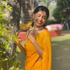 Dressed in a yellow saree for a sunny day event. I love incorporating the beauty of traditional Indian wear into my dance and personal style.