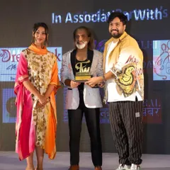 A proud moment receiving the award for Best Bridal Wear Designer from Bollywood actress Anupriya Goenka.