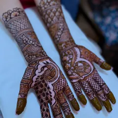 Another angle of the peacock henna, showing the intricate details of the feathers and the beautiful flow of the design.