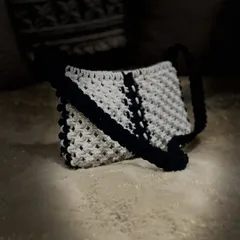 A different angle of the macrame baguette bag, showing the texture and structure of the knot work. It's sturdy, stylish, and made with so much love.