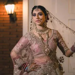 Capturing the bride's personality. This pose is full of grace and attitude, showing off the flow of her veil and the detailed work on her outfit.