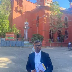 Outside the historic Madras High Court building in Chennai, where I handle litigation involving complex criminal matters.