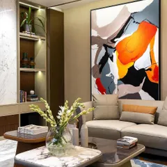 This large-scale abstract canvas, 'Colour Cluster', brings a dynamic energy to a modern living room. The bold strokes and vibrant color palette create a powerful focal point, designed to complement and elevate the surrounding interior design.