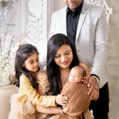 A beautiful moment with the whole family admiring their newborn baby. These are the memories that you will look back on for a lifetime.