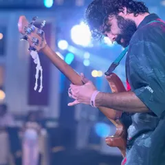 Our bassist lost in the music during a performance at the ITC Maratha for a corporate reunion. Even in a formal setting, we bring the rockstar energy.