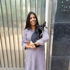 A happy client with her Chihuahua at the AQCS (Animal Quarantine and Certification Service) office in Delhi. This is the final government checkpoint before international travel, and I accompany all my clients here.