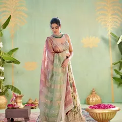 A pinch of tradition on your feed. This elegant lehenga is perfect for a daytime wedding function with its soft colours and beautiful details.