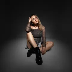 A full-body shot from a studio session, showcasing a modern and edgy look. This is part of a series for my press kit.
