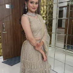 This client looks graceful in a light gold embroidered lehenga. It’s a versatile rental that can be dressed up or down for any festive occasion.