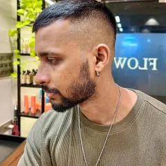 Another angle of the sharp skin fade, showing the clean lines and seamless blend.
