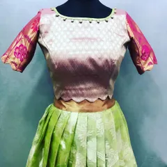 This set was created from a printed saree. I designed a simple blouse with a contrasting border and a pleated skirt to create a fresh, new ethnic outfit.