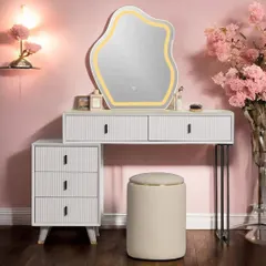 Transform your daily routine with this stunning vanity set. It features a unique freeform mirror with integrated LED lighting and a mix of open and closed storage, all finished with elegant fluted details.