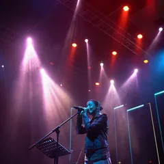 Caught in the spotlight. The stage lights, the smoke, the sound of the first note, it's a feeling that never gets old. I live for these moments.
