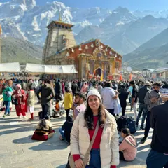A client enjoying the morning sun at the Kedarnath temple complex. We ensure our itineraries give you enough time to soak in the atmosphere and create your own peaceful moments.