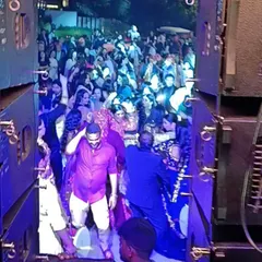 A view from behind the speakers during a baraat. The entire wedding party is dancing their way to the venue, creating an incredible energy that sets the tone for the rest of the celebration.