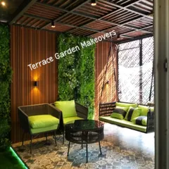 I designed this covered patio to be a perfect escape. It features comfortable seating, a relaxing swing, and lush artificial green walls, all under a stylish pergola, creating a cozy and elegant outdoor living room.