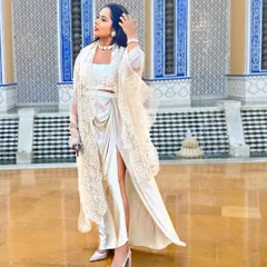 Another shot of my all-cream outfit, this time in a beautiful palace setting. The location really made the outfit feel even more special.