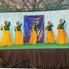 A wide shot of one of our group performances. I ensure every student gets their moment to shine on stage, celebrating their progress and dedication to the art form.