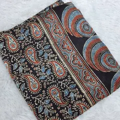 A classic Ajrakh print fabric featuring a traditional paisley design. This soft modal fabric is perfect for creating comfortable yet elegant kurtis and dresses.