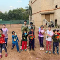 The entire academy celebrating the festival of colors. A fun-filled Holi on the courts with our players and coaches.