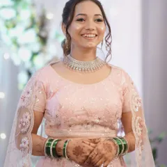 The complete engagement look, showing the beautiful smile of a happy client. The natural, dewy makeup ensures she looks fresh and radiant throughout her special day.