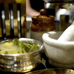Our attention to detail extends to every element of the buffet, including the use of ethnic pottery and marble mortar and pestles for serving traditional pickles and condiments.