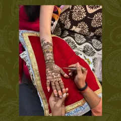 A snapshot of me at work, creating a full bridal design for a client in a comfortable home setting.