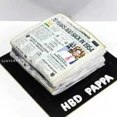An all-edible cake designed to look like a vintage newspaper from 1954 for a 70th birthday. This was for a former copywriter head at 'The Indian Express'.