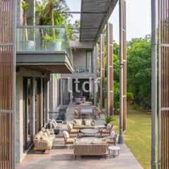 We designed this expansive deck to create a seamless dialogue between the built form and the landscape. The composition of earthy tones, clean architectural lines, and lush greenery results in a sophisticated outdoor experience that invites connection, reflection, and a gentle pause from the everyday.