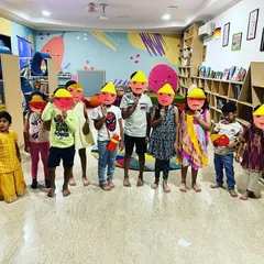 The whole group showing off the Ravan masks they made for our Dussehra celebration. It was a day of stories, crafts, and fun.
