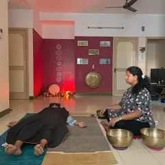 A private session in progress, where I guide a student through gentle yoga postures before the sound bath begins. This combination helps prepare the body and mind to fully receive the healing benefits of the sound vibrations.