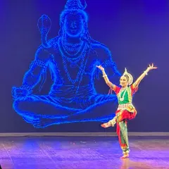 For this Odissi Manch Pravesh, or debut performance, we used a stunning LED backdrop of Lord Shiva to create a divine atmosphere. My job as a director is to ensure every element, from lighting to visuals, supports the dancer's artistry.