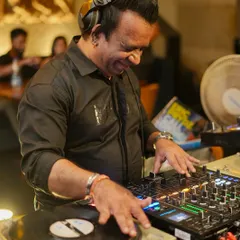 In my element, mixing classic house tunes on vinyl. The hands on feel of turntables is something I'll always love.