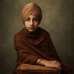 A similar pose in color, with the rich brown tones creating a warm and inviting mood. These portraits are designed to be timeless works of art.