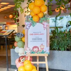 Welcome to the 'Wild ONE-derland'! We create personalized welcome signs like this one to greet your guests and set the theme from the moment they arrive.