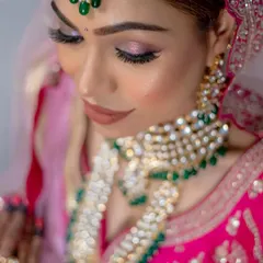Let's talk about my signature holographic bridal eyes. This close-up shows how I layer subtle shimmers and light-catching pigments to create a multi-dimensional effect that looks magical in person and in photos, without being overpowering.