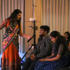 Our anchor engaging with the couple during a fun game. Our hosts are skilled at creating a comfortable and interactive environment on stage.