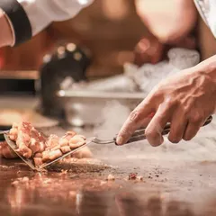 The thrill of live cooking at a Japanese Teppanyaki station. Our chef expertly prepares sizzling dishes right before the guests, adding an element of entertainment and ensuring every bite is incredibly fresh. This is a popular choice for weddings and cocktail nights.