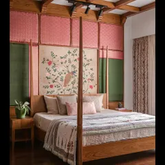 In this master bedroom, we designed a custom four-poster bed to be the centerpiece. The headboard is a tapestry of silk and brocade, stretching to the ceiling to create a sense of quiet grandeur and heritage.