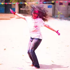Another action shot from our Holi celebration. The energy was incredible, with colors flying and everyone dancing their hearts out.