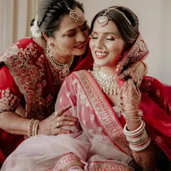 A beautiful, tender moment between the bride and her mother. The love and affection in this photo are palpable.