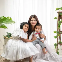 A beautiful portrait of a mother with her two children. My studio sessions are designed to capture the unique bond each family shares.