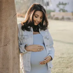 A quiet, beautiful moment for this mom to be. Her makeup for this outdoor maternity shoot was kept very natural and fresh to complement the soft, golden hour light.