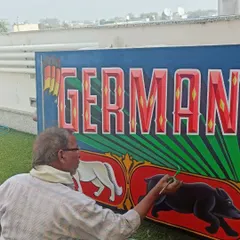 Here I am, working on a large canvas for the German Embassy event. The piece features animals symbolic to both India and Germany.