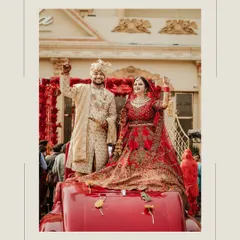 The groom's grand entry. Our client looks regal in a classic beige sherwani with subtle gold embroidery, making a memorable arrival on his wedding day.