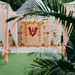 A view of the Nalugu setup from a distance, showing the elegant tent and seating arrangement. The design is both grand and intimate, perfect for this sacred ritual.