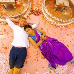 Every bride dreams of her wedding details, and we are here to make them a reality. For Sonam, who envisioned a Haldi in shades of purple, we created this beautiful setup with mandala-patterned flooring and floral decor.