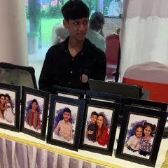 My compact digital caricature setup at a birthday party. All I need is a small table for my tablet and printer to create memorable party favors for your guests.